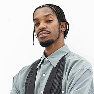 Headshot of 2026 Kresge Eminent Artist Panelist Haleem Stringz